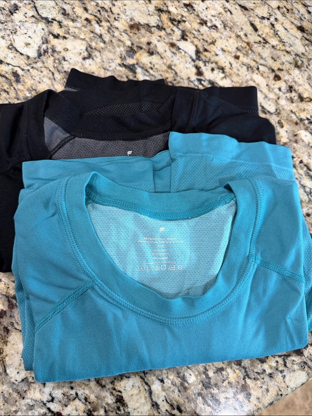 Fabletics Teal and Black Short Sleeve Performance Tees